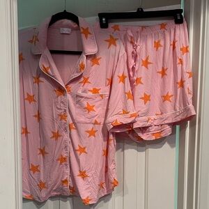 Pink Lily small pajama set.  Pink and orange star design.  Like new